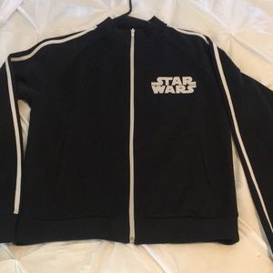 Like new Unisex Vintage Star Wars zip jacket w/pockets and Stormtrooper on back.